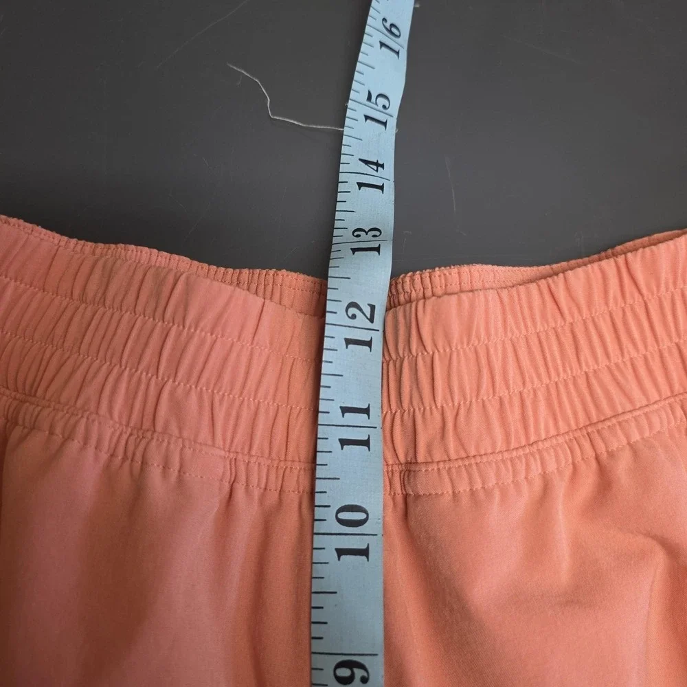 Lululemon Breakaway Track Pants Women 10 Orange Snap Button Joggers Yoga Gym